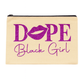 Beige pouch with purple text 'Dope Black Girl' on background