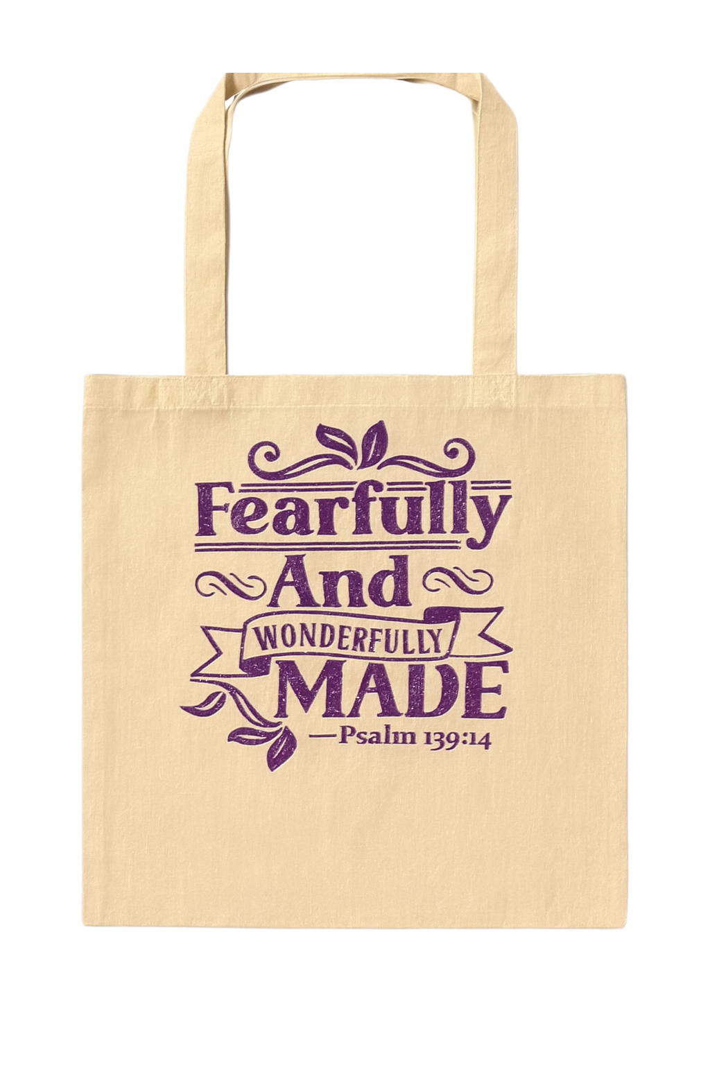 Beige tote bag with purple text 'Fearfully And Wonderfully Made Psalm 139:14' on a white background
