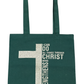 Green tote bag with a cross design and motivational quote on a white background