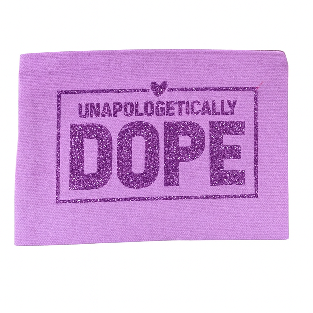 Purple towel with 'Unapologetically Dope' text on a white background