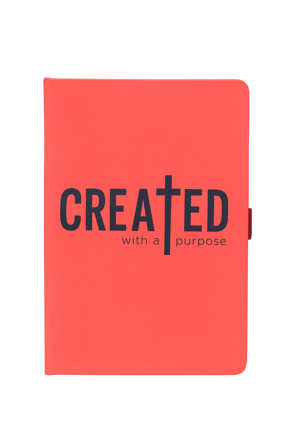 Red notebook with 'CREATED with a purpose' text on a white background